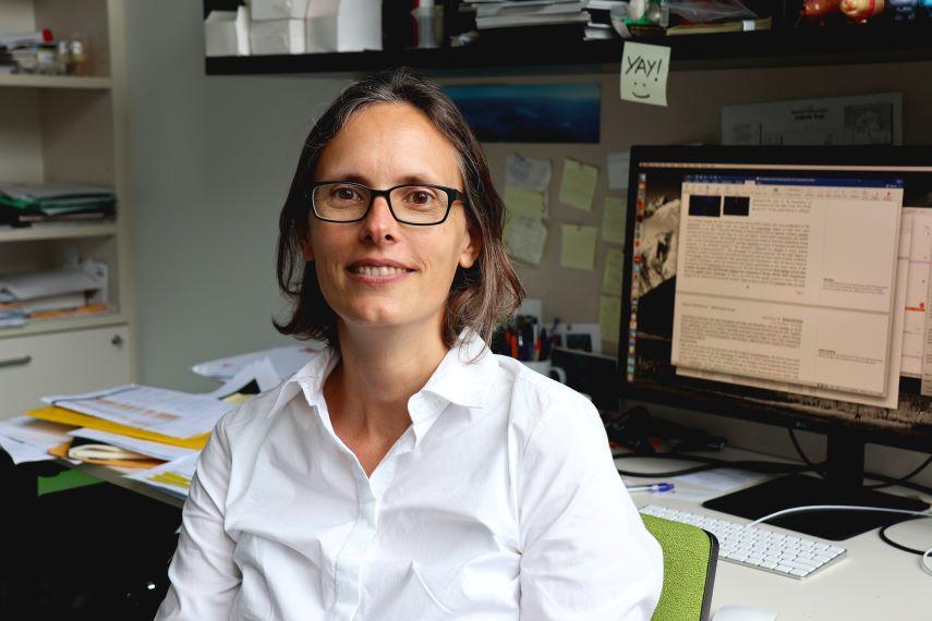 Deceased Alumna Professor Katharina Gaus in her office (Credit@University of New South Wales, Sydney) 